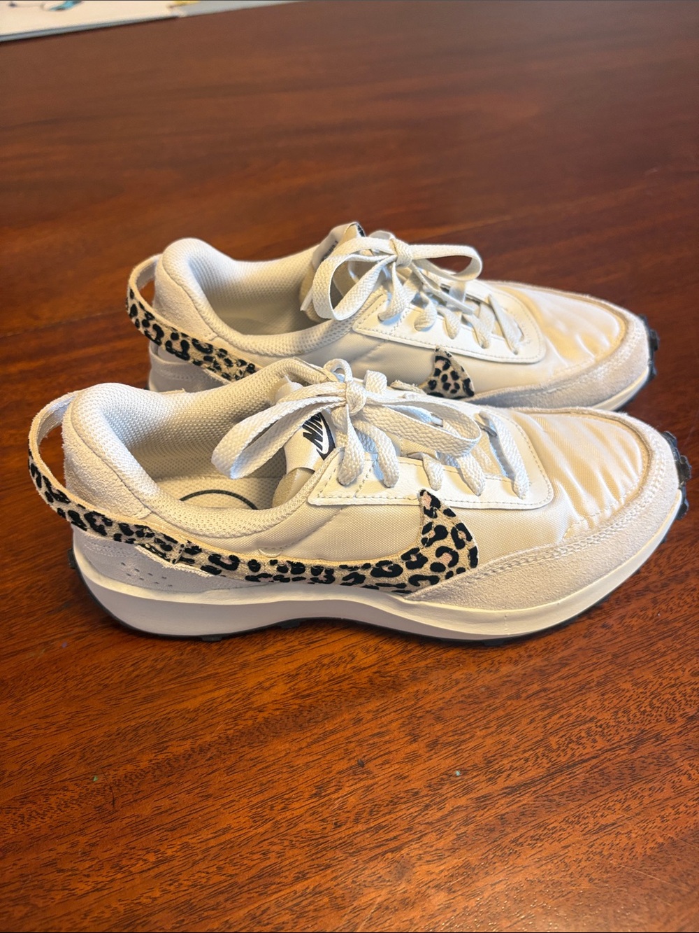 Nike Women’s White Sneakers with Leopard-Print Swoosh